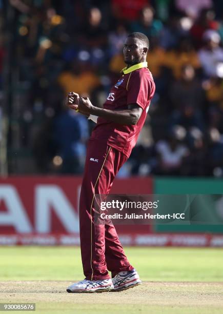 Jason Holder of The West Indies celebrates the wicket of George Dockrell of Ireland during The ICC Cricket World Cup Qualifier between The West...