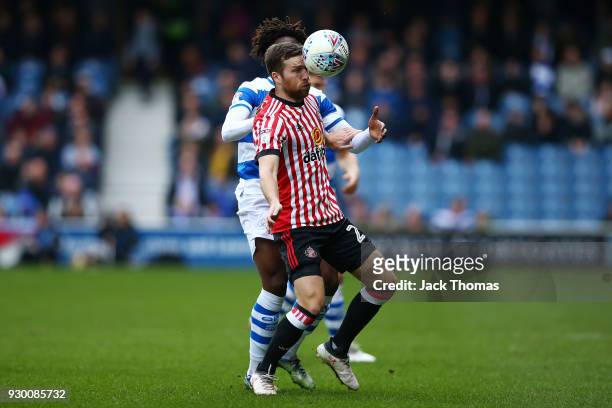 Adam Matthews of Sunderland and Eberechi Eze of QPR compete for the ball during the Sky Bet Championship match between QPR and Sunderland at Loftus...