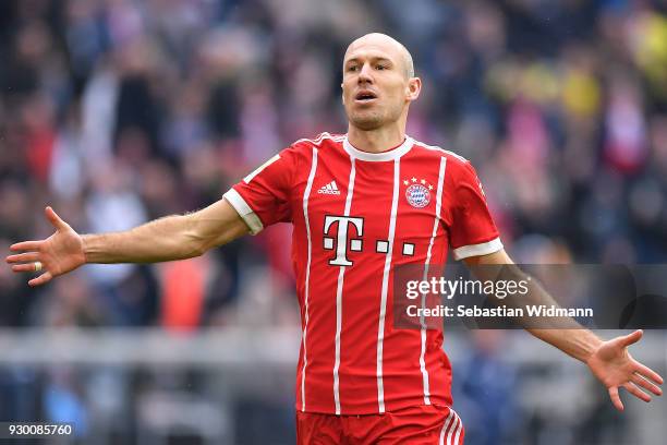 Arjen Robben of Bayern Muenchen celebrates after he scored a goal to make it 4:0 during the Bundesliga match between FC Bayern Muenchen and Hamburger...