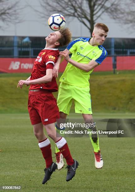 Niall Brookwell of Liverpool and Louie Sibley of Derby County in action during the U18 Premier League match between Liverpool and Derby County at The...