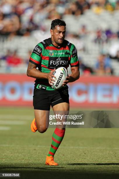 John Sutton of the Rabbitohs runs the ball during the round one NRL match between the South Sydney Rabbitohs and the New Zealand Warriors at Optus...