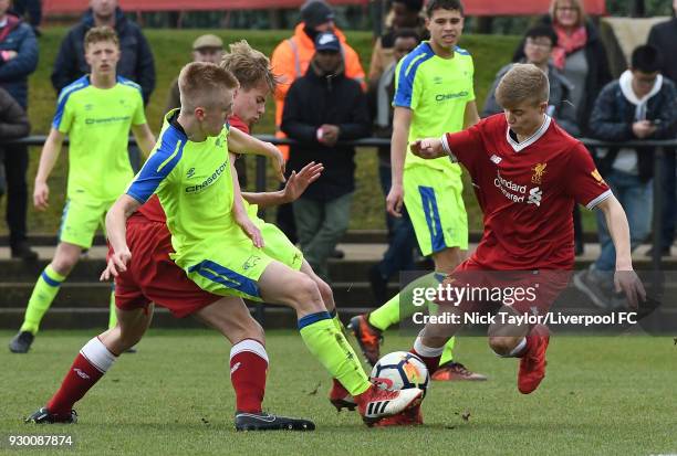 Jack Bearne of Liverpool and Louie Sibley of Derby County in action during the U18 Premier League match between Liverpool and Derby County at The...