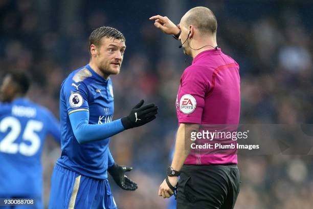 Jamie Vardy of Leicester City talks to referee Bobby Madley during the Premier League match between West Bromwich Albion and Leicester City at The...