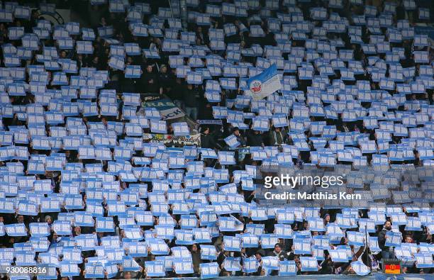 Supporters of Rostock celebrate their team during the 3.Liga match between FC Hansa Rostock and SC Paderborn 07 at Ostseestadion on March 10, 2018 in...