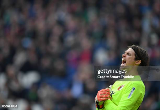 Marwin Hitz of Augsburg shouts during the Bundesliga match between Hannover 96 and FC Augsburg at HDI-Arena on March 10, 2018 in Hanover, Germany.