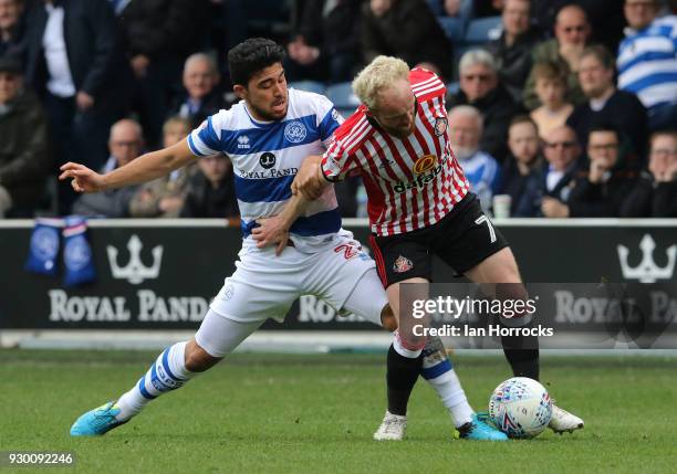 Jonny Williams of Sunderland is tackled by Massimo Luongo of QPR during the Sky Bet Championship match between Queens Park Rangers and Sunderland at...