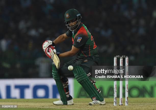 Bangladesh cricketer Tamim Iqbal plays a shot during the third Twenty20 international cricket match between Bangladesh and Sri Lanka of the...