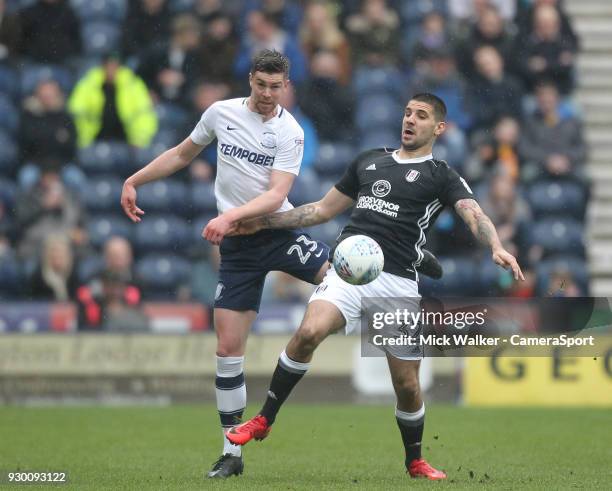 Preston North End's Paul Huntington battles with Fulham's Aleksandar Mitrovic during the Sky Bet Championship match between Preston North End and...