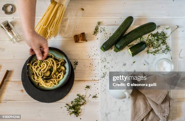 pasta with zucchini - zucchine stock pictures, royalty-free photos & images