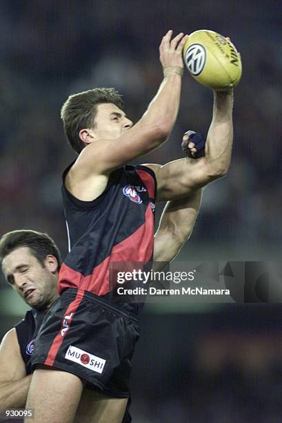 Matthew Lloyd for Essendon takes the mark over Darryl Wakelin for Port Adelaide, in the match between the Essendon Bombers and the Port Adelaide...