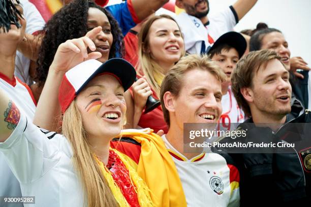 german football fans watching football match - thug boy stock pictures, royalty-free photos & images