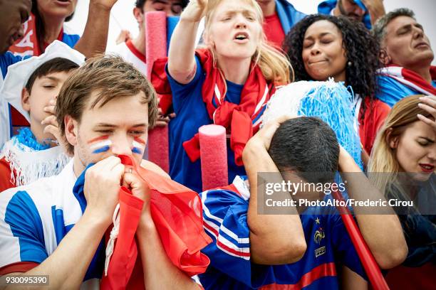 french football fans watching football match - thug boy stock pictures, royalty-free photos & images