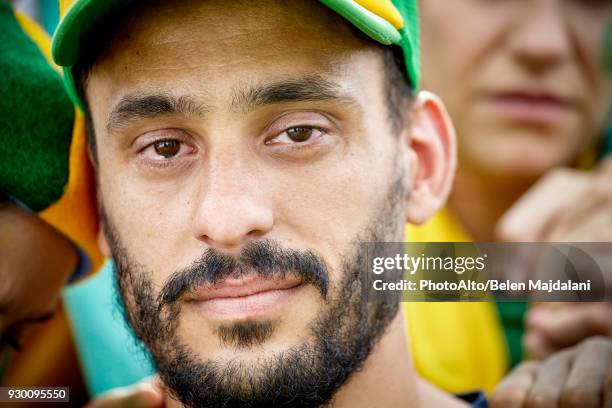 football fan with tears in his eyes, portrait - cu fan stockfoto's en -beelden