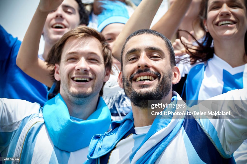 Argentinian football fans cheering at match