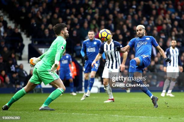 Riyad Mahrez of Leicester City scores his sides second goal during the Premier League match between West Bromwich Albion and Leicester City at The...