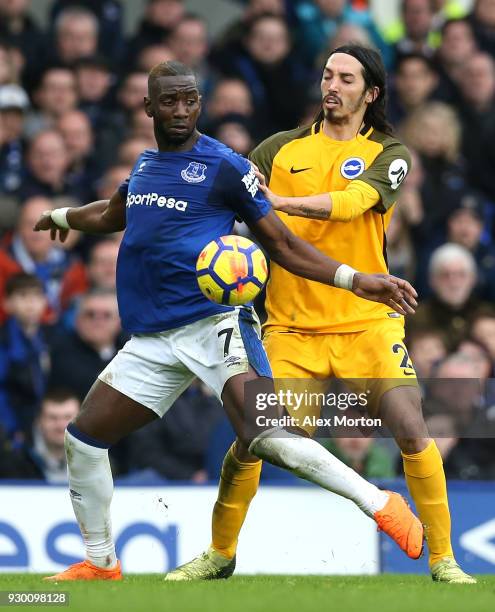 Yannick Bolasie is challenged by Matias Ezequiel Schelotto of Brighton and Hove Albion during the Premier League match between Everton and Brighton...