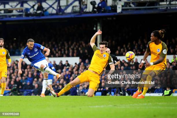 Cenk Tosun of Everton scores his side's second goal during the Premier League match between Everton and Brighton and Hove Albion at Goodison Park on...