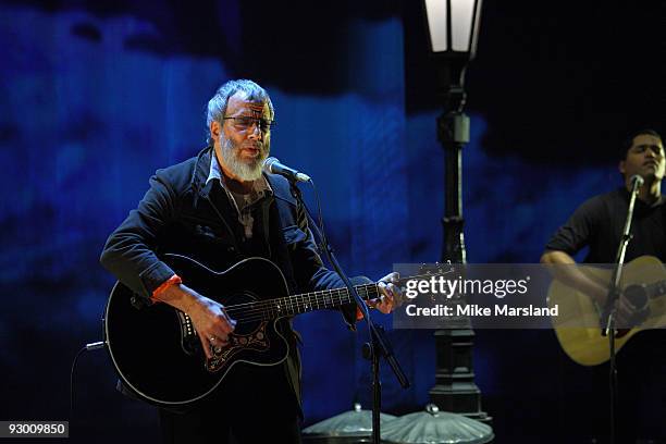 Yusuf Islam performs during a photocall to launch his 'Guess I'll Take My Time' tour at Elstree Studios on November 12, 2009 in Borehamwood, England.