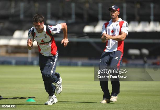 James Anderson of England does some fitness work with Sajid Mahmood of England during the England nets session at the Wanderers Stadium on November...