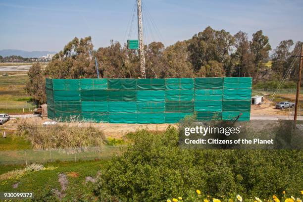 Sound dampening screen, SoCal Gas natural gas storage facility, Playa Del Rey, Los Angeles, California, USA.