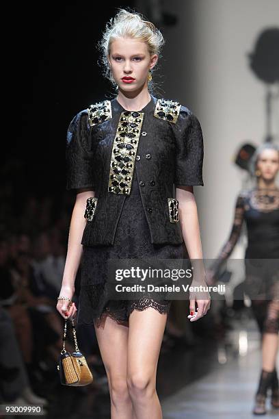 Model walks down the runway during the Dolce & Gabbana show as part of Milan Womenswear Fashion Week Spring/Summer 2010 on September 27, 2009 in...