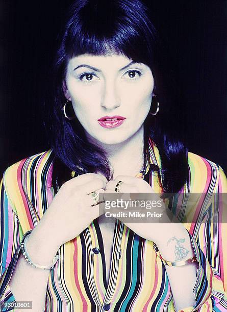 Presenter Davina McCall poses for a studio portrait session in 1996 in London.