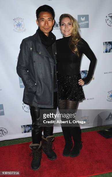 Actor James Kyson and singer Jamee Mae Kyson attend the Apex Protection Project's Annual "Wine And Wolves" Fundraiser" held at Malibu Wines on March...