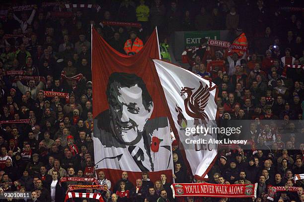 Liverpool fans show off a Bob Paisley banner prior to the Barclays Premier League match between Liverpool and Birmingham City at Anfield on November...