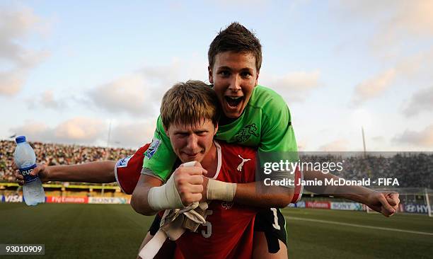 Benjamin Siegrist and Sead Hajrovic of Switzerland celebrate their place in the Final during the FIFA U17 World Cup Semi-Final 1 between Colombia and...