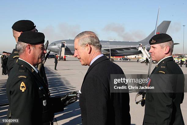 Prince Charles, Prince of Wales reviews a Guard of Honour during a Departure Ceremony at Ottawa Airport on November 12, 2009 in Ottawa, Canada. The...