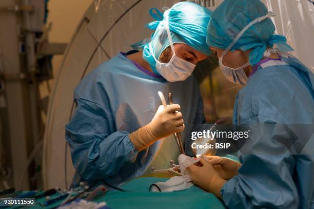 Orthopedic operating theatre, Pasteur 2 Hospital, Nice, France, Medullary liberation and arthrodesis, patient suffering from lumbar stenosis caused...