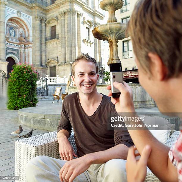male couple enjoy time together. - gary bond stock pictures, royalty-free photos & images