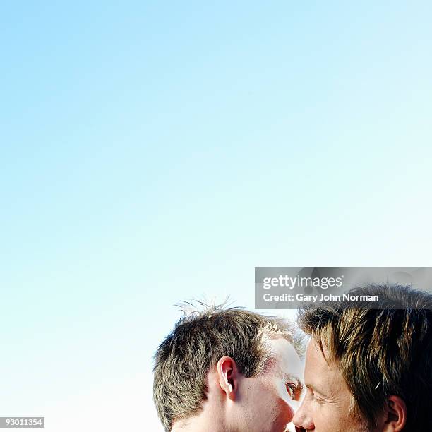 male couple enjoy embrace - gary bond stock pictures, royalty-free photos & images