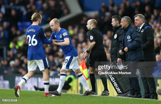 Tom Davies of Everton is substituted off as Davy Klaassen of Everton comes on during the Premier League match between Everton and Brighton and Hove...