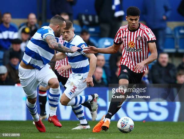 Ashley Fletcher of Sunderland and Joel Lynch of QPR in action during the Sky Bet Championship match between QPR and Sunderland at Loftus Road on...