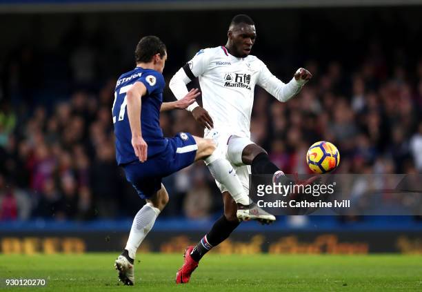 Christian Benteke of Crystal Palace controls the ball ahead of Andreas Christensen of Chelsea during the Premier League match between Chelsea and...