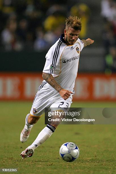 David Beckham of the Los Angeles Galaxy moves to cross the ball during Game 2 of the MLS Western Conference Semifinals match against Chivas USA at...