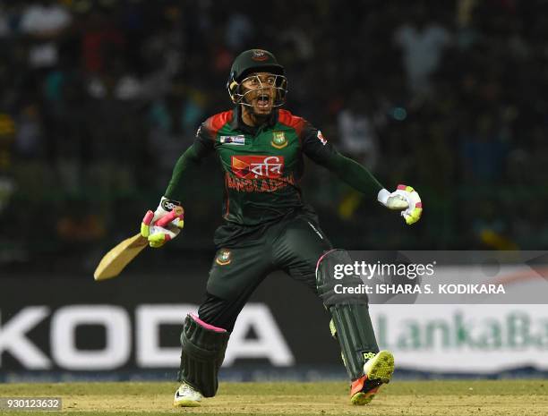 Bangladesh cricketer Mushfiqur Rahim celebrate their team's five wickets victory over Sri Lanka after during the third Twenty20 international cricket...