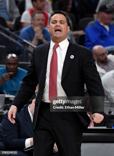 Head coach Sean Miller of the Arizona Wildcats yells to his players during a semifinal game of the Pac-12 basketball tournament against the UCLA...