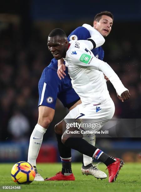 Christian Benteke of Crystal Palace is challenged by Cesar Azpilicueta of Chelsea during the Premier League match between Chelsea and Crystal Palace...