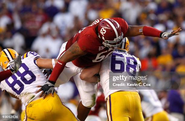 Terrence Cody of the Alabama Crimson Tide leaps to block a field goal by the Louisiana State University Tigers at Bryant-Denny Stadium on November 7,...