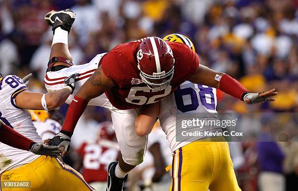 Terrence Cody of the Alabama Crimson Tide leaps to block a field goal by the Louisiana State University Tigers at Bryant-Denny Stadium on November 7,...