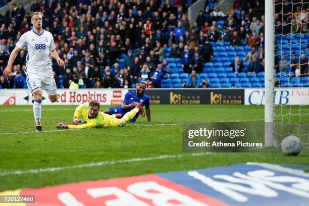 Junior Hoilett of Cardiff City has a shot on goal which rolls past David Stockdale of Birmingham City during the Sky Bet Championship match between...