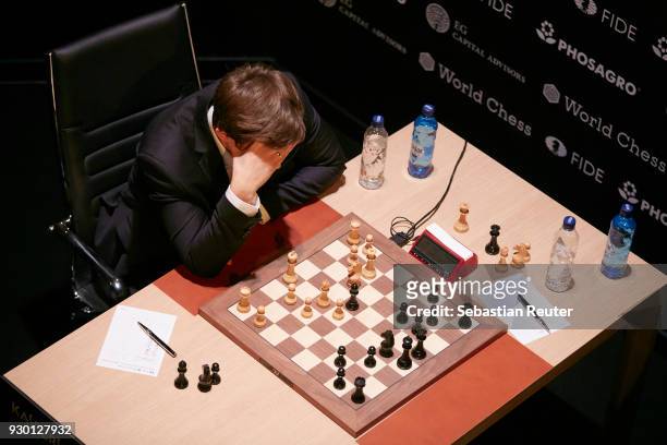 Sergei Karjakin is seen playing the first round at the First Move Ceremony during the World Chess Tournament on March 10, 2018 in Berlin, Germany.