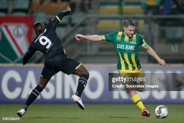 Thierry Ambrose of NAC Breda, Aaron Meijers of ADO Den Haag during the Dutch Eredivisie match between ADO Den Haag v NAC Breda at the Cars Jeans...