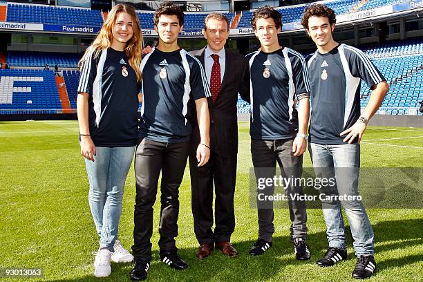 Andrea Guasch of the Disney Channel Spain, Joe Jonas, Nick Jonas, Emilio Butragueno and Kevin Jonas pose during a visit of the Jonas Brothers as...