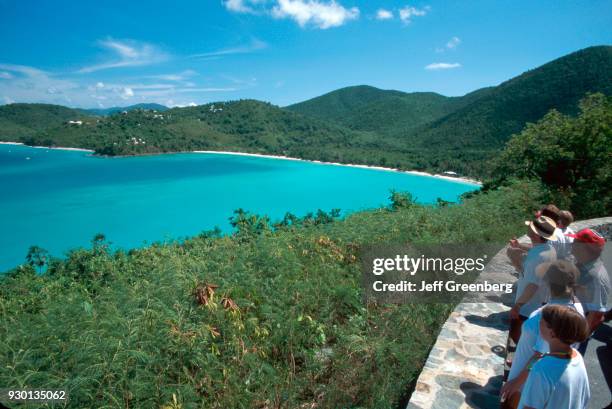 Danish tourists at the North Shore Road overlook, Francis Bay, Virgin Islands National Park, St. John, US Virgin Islands.