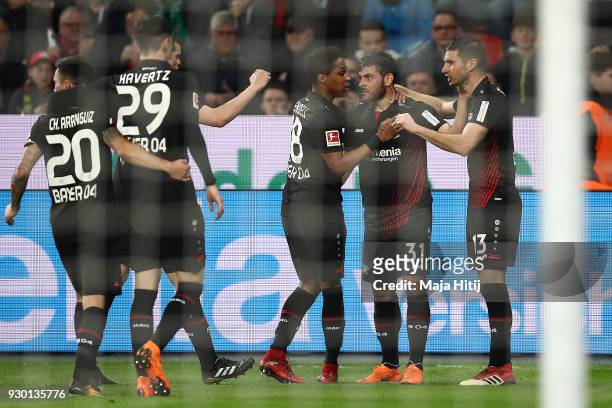 Lucas Alario of Leverkusen celebrates with his team after he scored a goal to make it 1:0 during the Bundesliga match between Bayer 04 Leverkusen and...