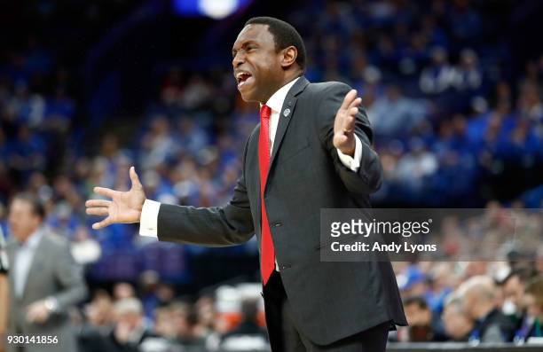 Avery Johnson the head coach of the Alabama Crimson Tide gives instructions to his team against the Kentucky Wildcats during the semifinals of the...