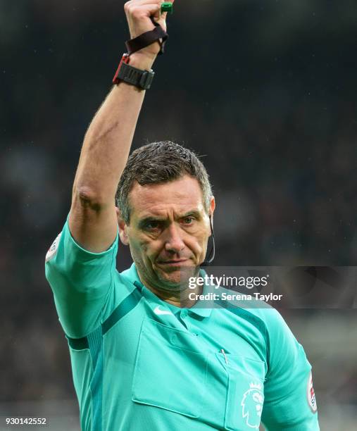 Referee Andre Marriner during the Premier League match between Newcastle United and Southampton at St.James' Park on March 10 in Newcastle upon Tyne,...